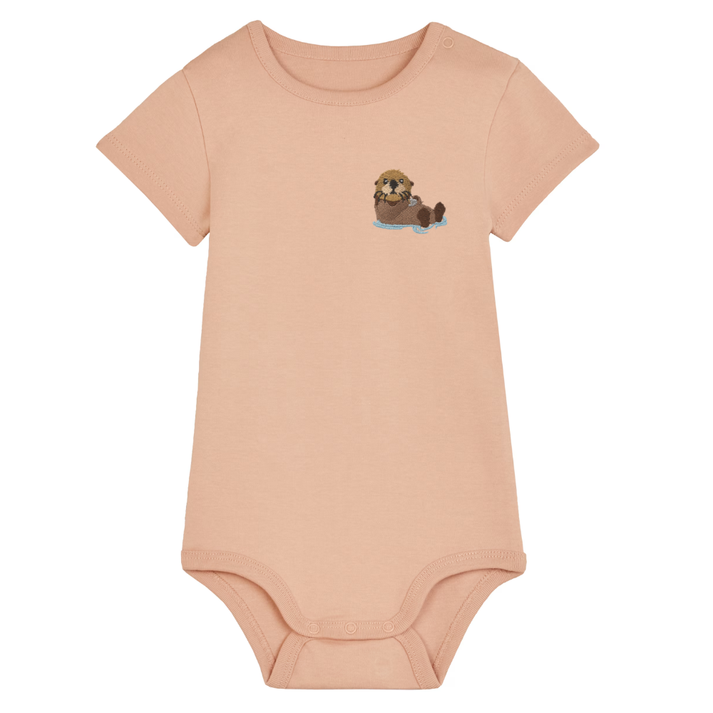 Heytoki Baby-Body aus Bio-Baumwolle in Fraiche Peche (Pfirsich) mit gesticktem Ottermotiv