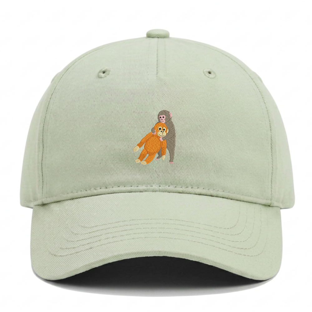 Heytoki Kinder-Cap aus Bio-Baumwolle in Pistachio (Pistaziengrün) mit gesticktem Affenmotiv