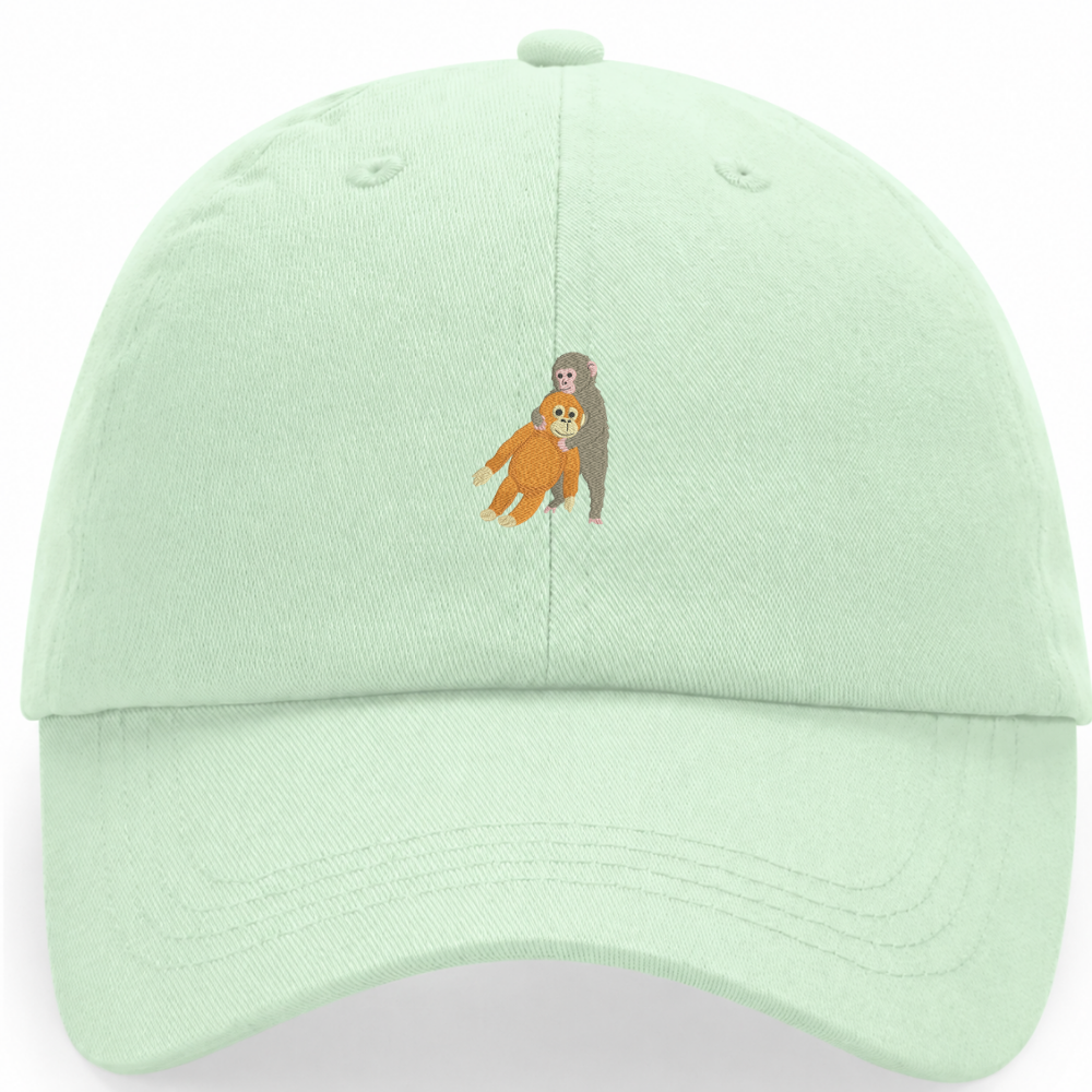 Heytoki Pastell-Cap aus Bio-Baumwolle in Pistachio (Pistaziengrün) mit gesticktem Affenmotiv