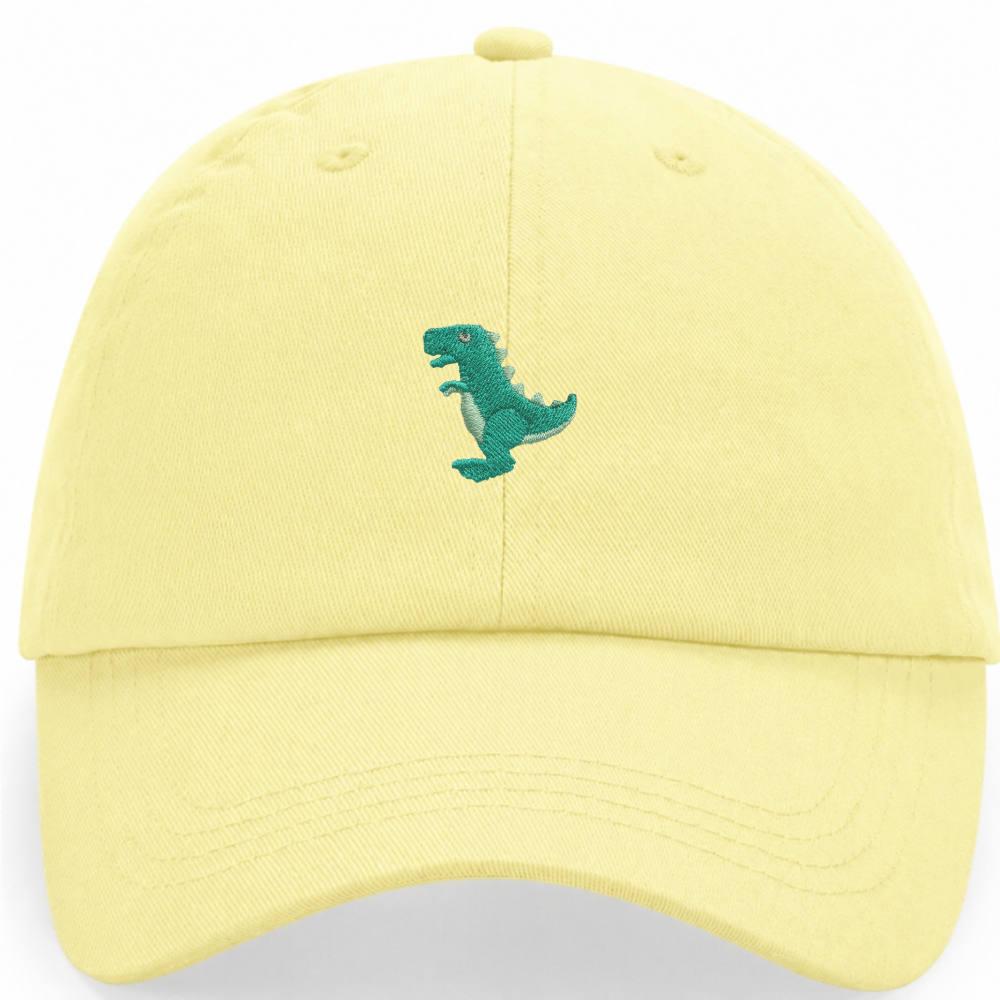 Heytoki Pastell-Cap aus Bio-Baumwolle in Pastel Lemon mit gesticktem Dinomotiv